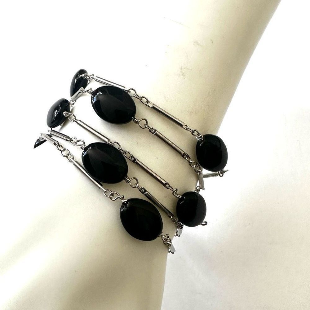 Black and silver tone multi strand beaded bracelet